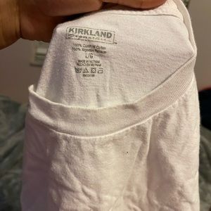 Regular white T-shirt nothing wrong with it just wrinkled